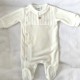 Tutto cream velour babygrow.